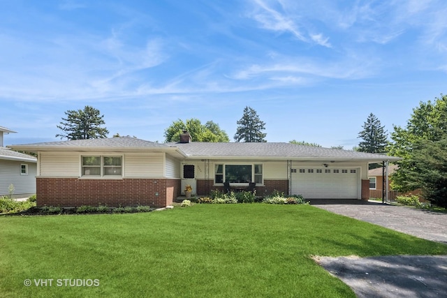 3004 Blarneystone Ln, Cary, IL 60013 - single story home with brick siding, driveway, a garage, and a front lawn