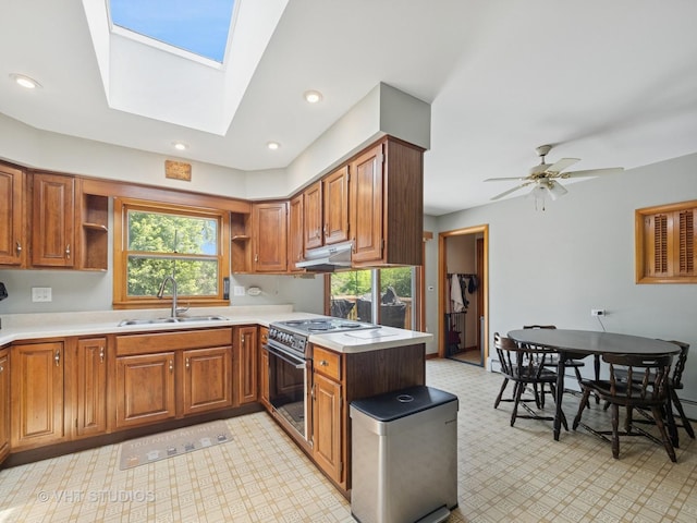 3004 Blarneystone Ln, Cary, IL 60013 - kitchen with open shelves, stainless steel electric stove, under cabinet range hood, light floors, and light countertops