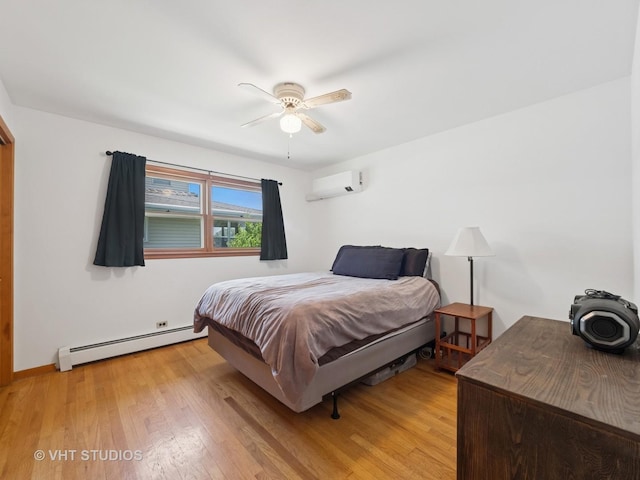 3004 Blarneystone Ln, Cary, IL 60013 - bedroom with a baseboard radiator, a wall mounted air conditioner, light wood-style flooring, and ceiling fan