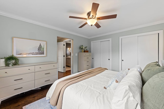 26W079 Thomas Rd, Wheaton, IL 60187 - bedroom featuring dark wood-style floors, multiple closets, ornamental molding, and a ceiling fan