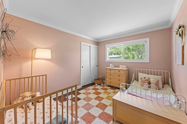 26W079 Thomas Rd, Wheaton, IL 60187 - bedroom with ornamental molding, a closet, and light colored carpet