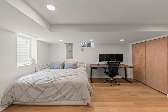 26W079 Thomas Rd, Wheaton, IL 60187 - bedroom with electric panel, light wood-type flooring, recessed lighting, an office area, and a closet