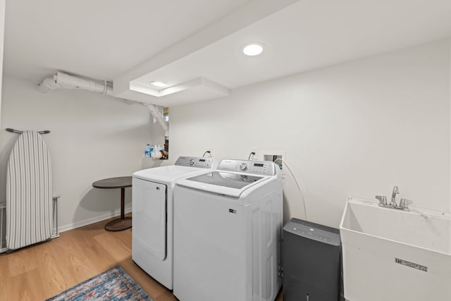 26W079 Thomas Rd, Wheaton, IL 60187 - washroom with washing machine and dryer, light wood finished floors, and recessed lighting