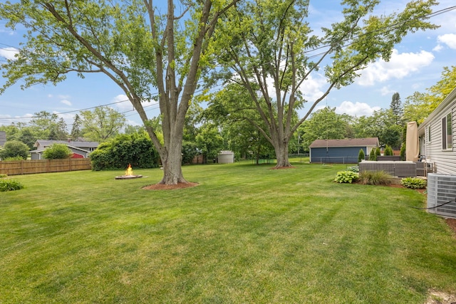 26W079 Thomas Rd, Wheaton, IL 60187 - fenced backyard featuring an outdoor fire pit
