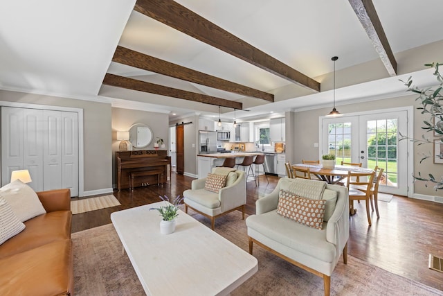 26W079 Thomas Rd, Wheaton, IL 60187 - living area featuring dark wood-style flooring, french doors, beam ceiling, and ornamental molding