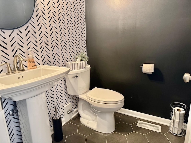 1389 Clifton Ave, Beecher, IL 60401 - half bathroom featuring toilet and tile patterned flooring