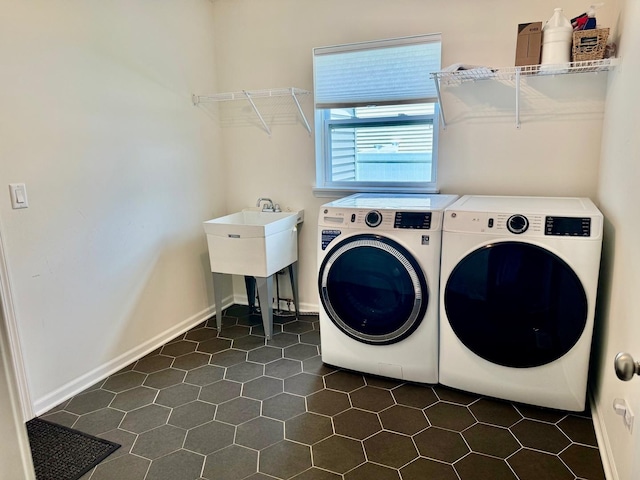1389 Clifton Ave, Beecher, IL 60401 - laundry room featuring washing machine and dryer and dark tile patterned flooring