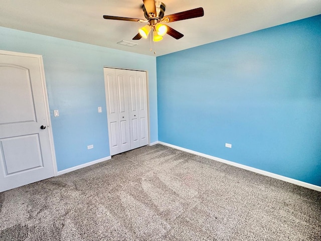 1389 Clifton Ave, Beecher, IL 60401 - unfurnished bedroom featuring carpet, a closet, and a ceiling fan
