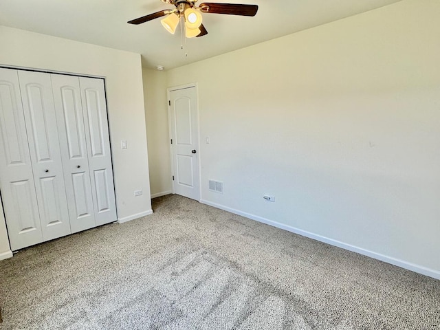 1389 Clifton Ave, Beecher, IL 60401 - unfurnished bedroom featuring carpet floors, a closet, and a ceiling fan