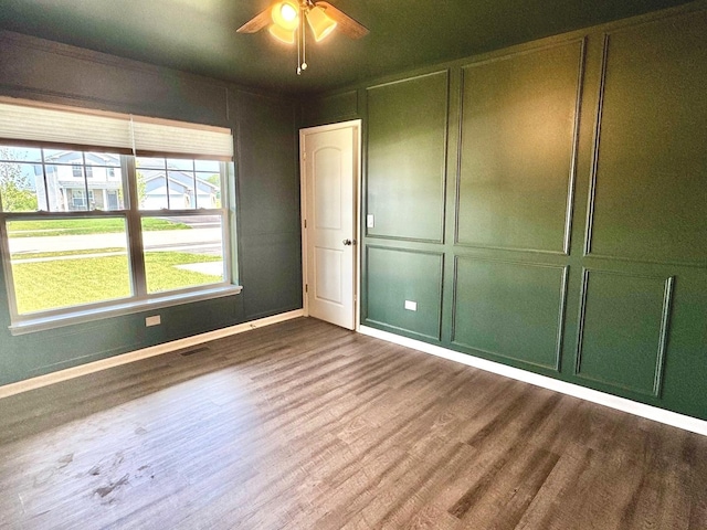 1389 Clifton Ave, Beecher, IL 60401 - unfurnished bedroom featuring dark wood finished floors