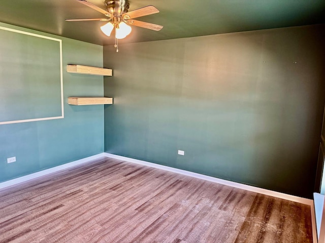 1389 Clifton Ave, Beecher, IL 60401 - spare room with wood finished floors and ceiling fan