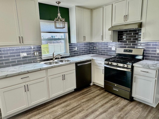 1389 Clifton Ave, Beecher, IL 60401 - kitchen with gas range, dishwasher, under cabinet range hood, light wood finished floors, and white cabinetry