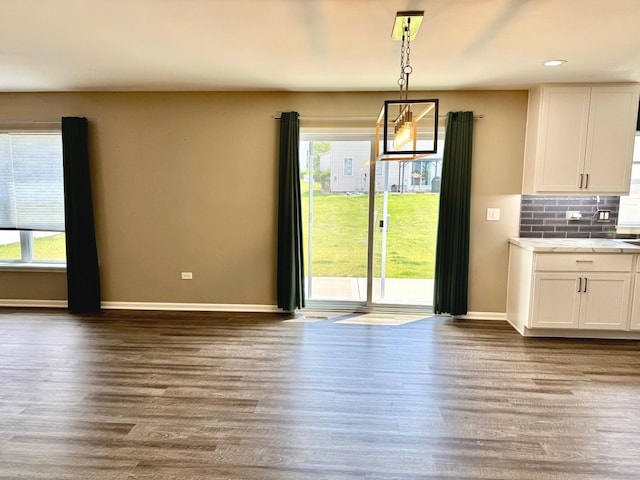 1389 Clifton Ave, Beecher, IL 60401 - unfurnished dining area featuring plenty of natural light, wood finished floors, and recessed lighting