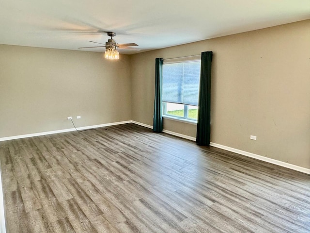 1389 Clifton Ave, Beecher, IL 60401 - spare room featuring a ceiling fan and wood finished floors