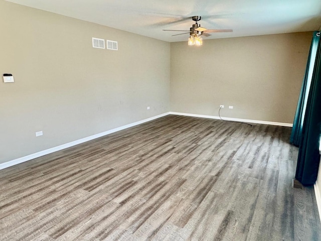 1389 Clifton Ave, Beecher, IL 60401 - unfurnished room with a ceiling fan and wood finished floors