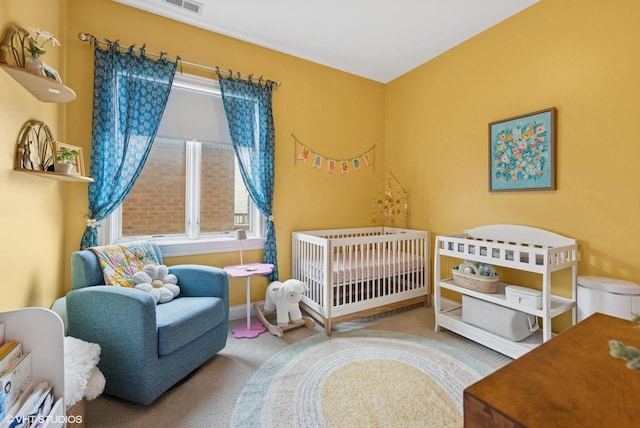 3252 N California Ave Unit 2, Chicago, IL 60618 - bedroom with carpet and a crib