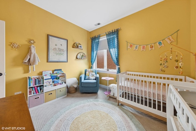 3252 N California Ave Unit 2, Chicago, IL 60618 - carpeted bedroom featuring a crib and baseboards