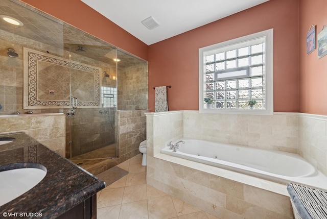 3252 N California Ave Unit 2, Chicago, IL 60618 - bathroom featuring a jetted tub, double vanity, a stall shower, and tile patterned flooring