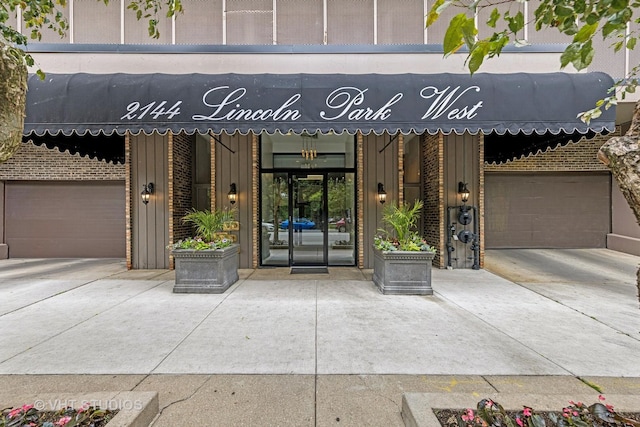 2144 N Lincoln Park W Unit 23B, Chicago, IL 60614 - property entrance with board and batten siding