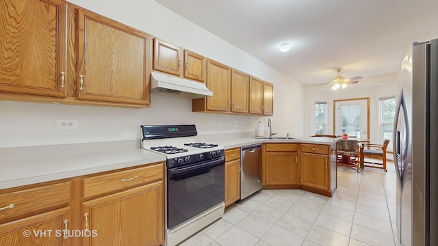 832 Veridian Way Unit 832, Cary, IL 60013 - kitchen featuring under cabinet range hood, appliances with stainless steel finishes, a peninsula, a ceiling fan, and light tile patterned floors