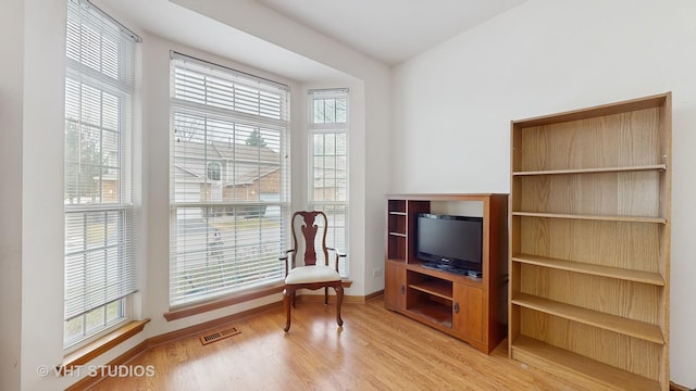 832 Veridian Way Unit 832, Cary, IL 60013 - living area featuring light wood-style flooring and healthy amount of natural light