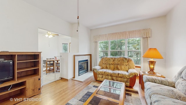 832 Veridian Way Unit 832, Cary, IL 60013 - living room with light wood-style floors, a tile fireplace, and ceiling fan