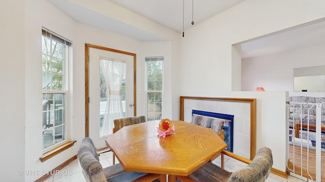 832 Veridian Way Unit 832, Cary, IL 60013 - dining space featuring a fireplace and tile patterned flooring