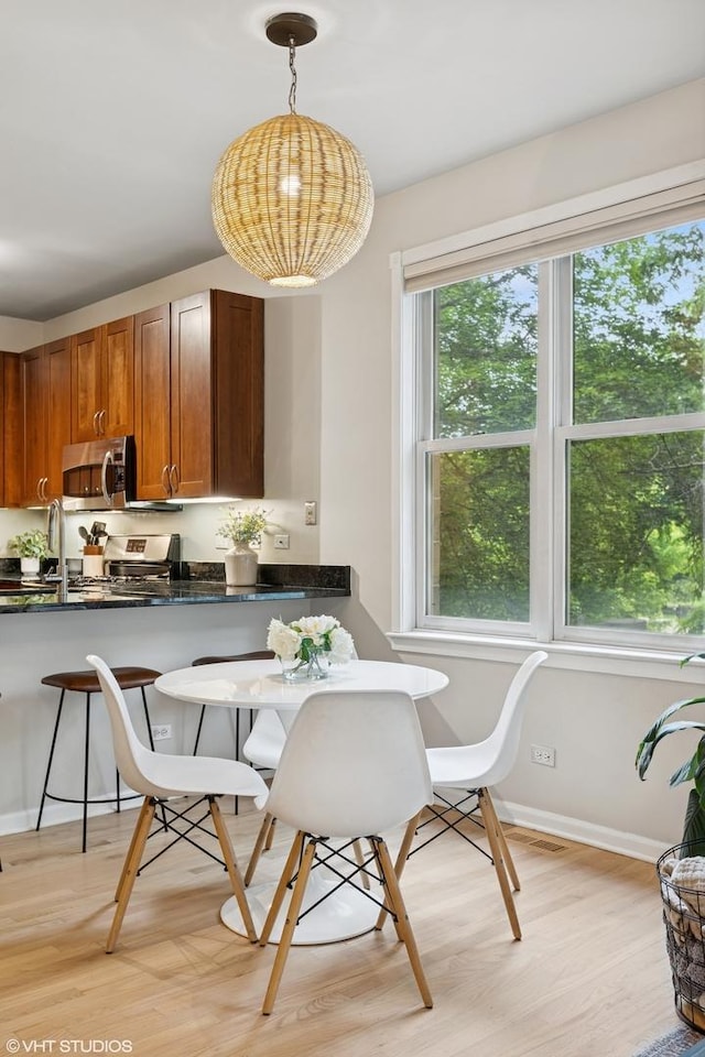 1048 W Lill Ave Unit 2, Chicago, IL 60614 - dining space featuring light wood-style flooring