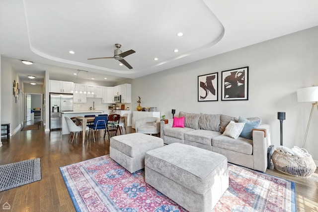 2736 N Wolcott Ave Unit 101, Chicago, IL 60614 - living room featuring a raised ceiling, recessed lighting, ceiling fan, and dark wood finished floors