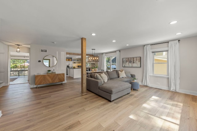 523 Kipling Ct, Wheaton, IL 60187 - living area featuring recessed lighting, light wood-style flooring, and a chandelier