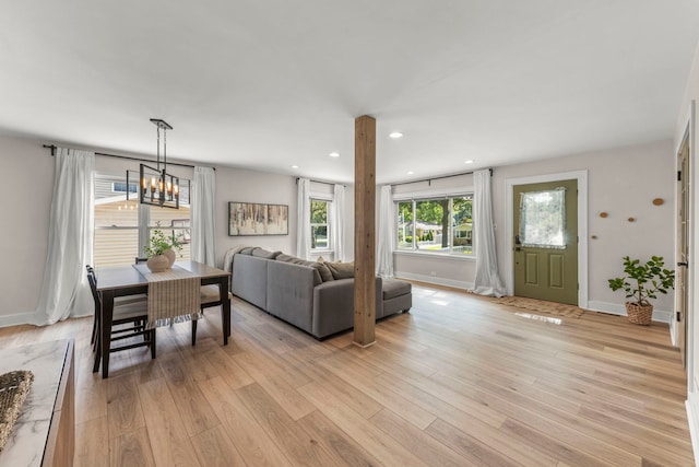 523 Kipling Ct, Wheaton, IL 60187 - living room with light wood-style floors, recessed lighting, and a chandelier