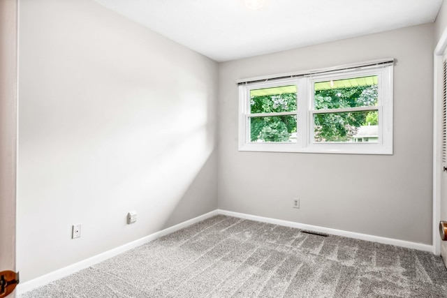 207 Hammitt Dr, Normal, IL 61761 - carpeted spare room with baseboards