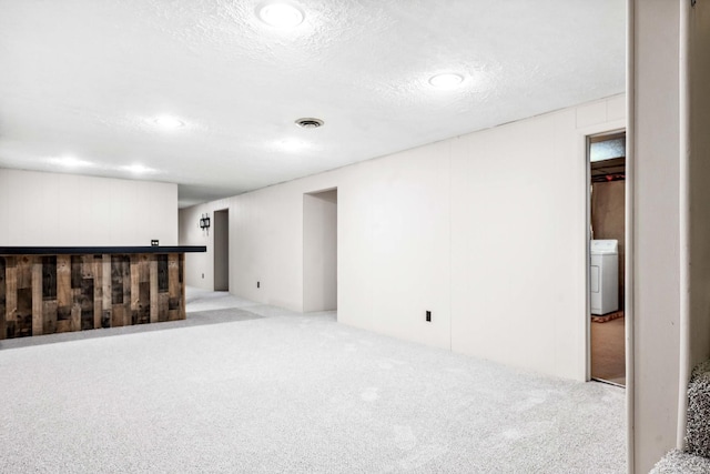 207 Hammitt Dr, Normal, IL 61761 - finished basement featuring carpet floors, washer / dryer, a bar, a textured ceiling, and recessed lighting