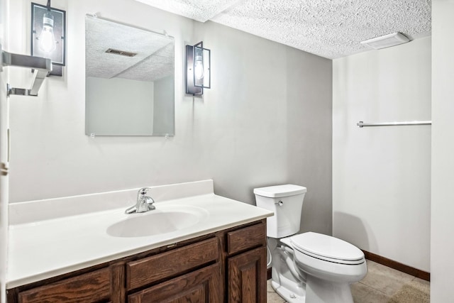 207 Hammitt Dr, Normal, IL 61761 - bathroom with a textured ceiling and vanity