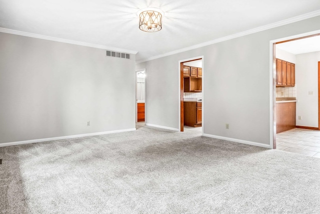 207 Hammitt Dr, Normal, IL 61761 - unfurnished living room featuring a chandelier, crown molding, and light carpet