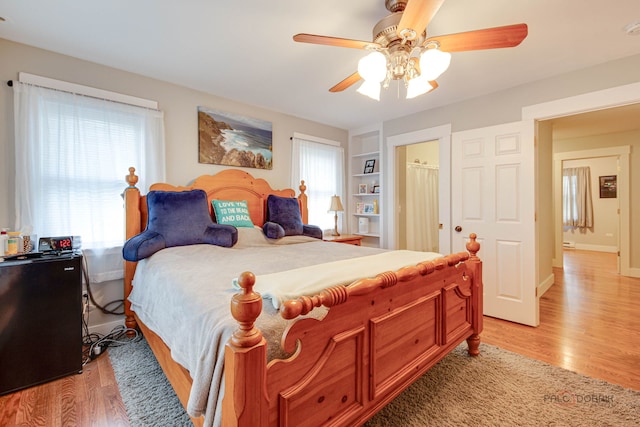 20760 N Florence Ave, Lincolnshire, IL 60069 - bedroom featuring light wood-style flooring and ceiling fan