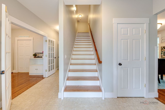 20760 N Florence Ave, Lincolnshire, IL 60069 - stairway with tile patterned flooring and french doors
