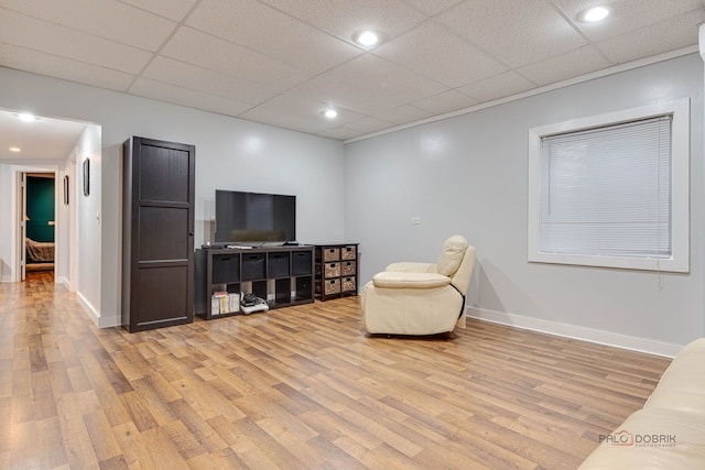 20760 N Florence Ave, Lincolnshire, IL 60069 - living area with light wood-style flooring and a paneled ceiling