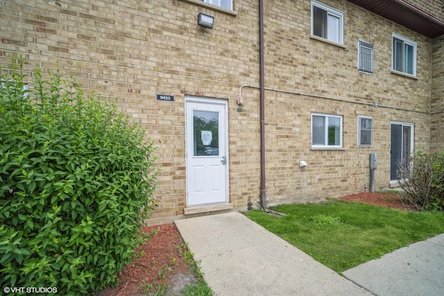 9423 Bay Colony Dr Unit 3N, Des Plaines, IL 60016 - view of exterior entry featuring brick siding