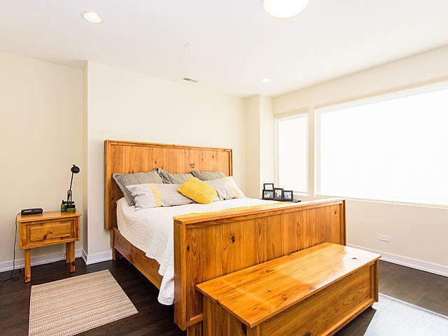 2036 W Huron St, Chicago, IL 60612 - bedroom with dark wood-style floors and recessed lighting