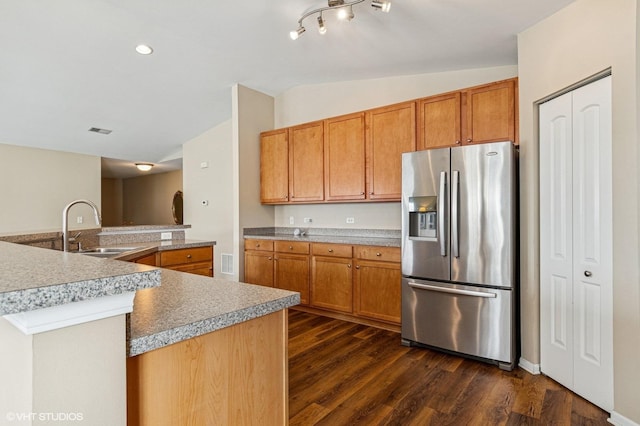 5113 Williston Ct Unit 0, Plainfield, IL 60586 - kitchen featuring stainless steel fridge, lofted ceiling, dark wood-style flooring, and brown cabinets