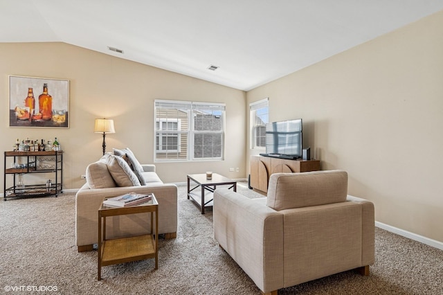 5113 Williston Ct Unit 0, Plainfield, IL 60586 - carpeted living area featuring vaulted ceiling and baseboards