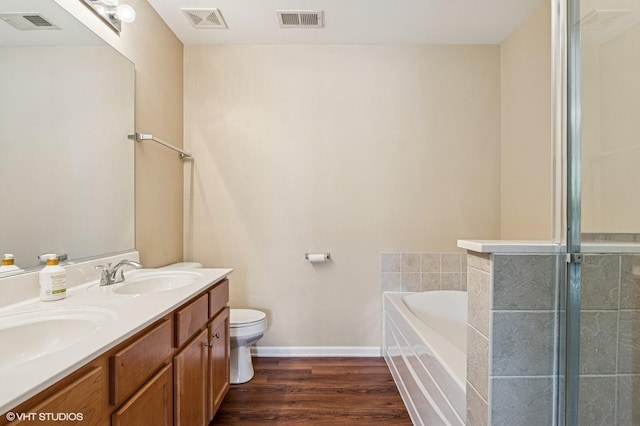 5113 Williston Ct Unit 0, Plainfield, IL 60586 - bathroom with a bath, double vanity, wood finished floors, and a shower