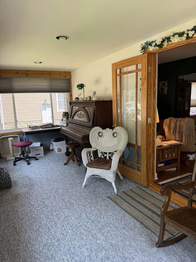 home office with carpet flooring
