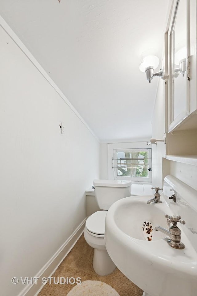 822 Clinton Pl, Evanston, IL 60201 - half bath with vaulted ceiling and toilet
