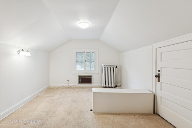 822 Clinton Pl, Evanston, IL 60201 - bonus room with carpet floors, radiator, an AC wall unit, and vaulted ceiling