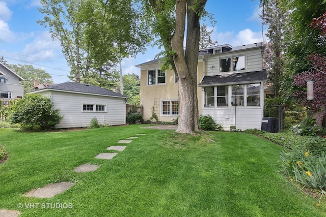 822 Clinton Pl, Evanston, IL 60201 - rear view of property featuring an outdoor structure and a shingled roof