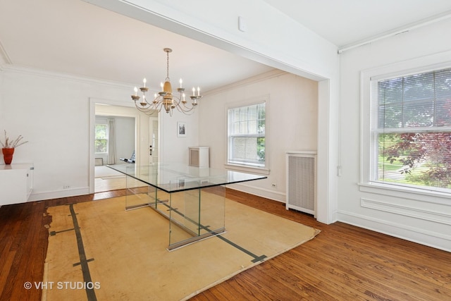 822 Clinton Pl, Evanston, IL 60201 - unfurnished dining area with wood finished floors, plenty of natural light, and crown molding
