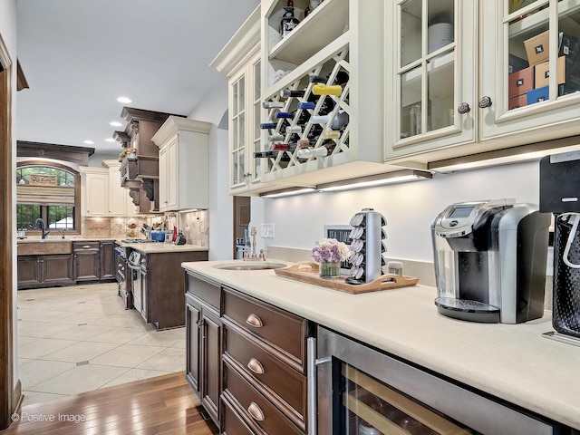 22 Yorkshire Woods, Oak Brook, IL 60523 - bar featuring wine cooler, backsplash, recessed lighting, and light tile patterned floors