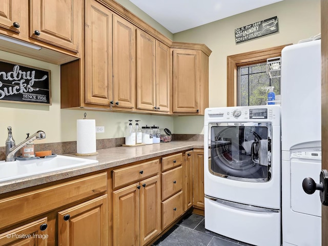 22 Yorkshire Woods, Oak Brook, IL 60523 - laundry room featuring independent washer and dryer, cabinet space, and dark tile patterned floors